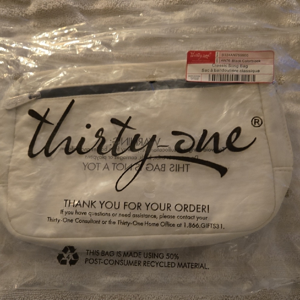 Thirty-One Cream Sling Bag